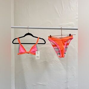 Medium Maaji women’s reversible bikini top and bottom.